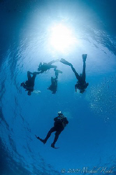 After the dive, go into the light. But, which direction? :-) by Michael Henke 